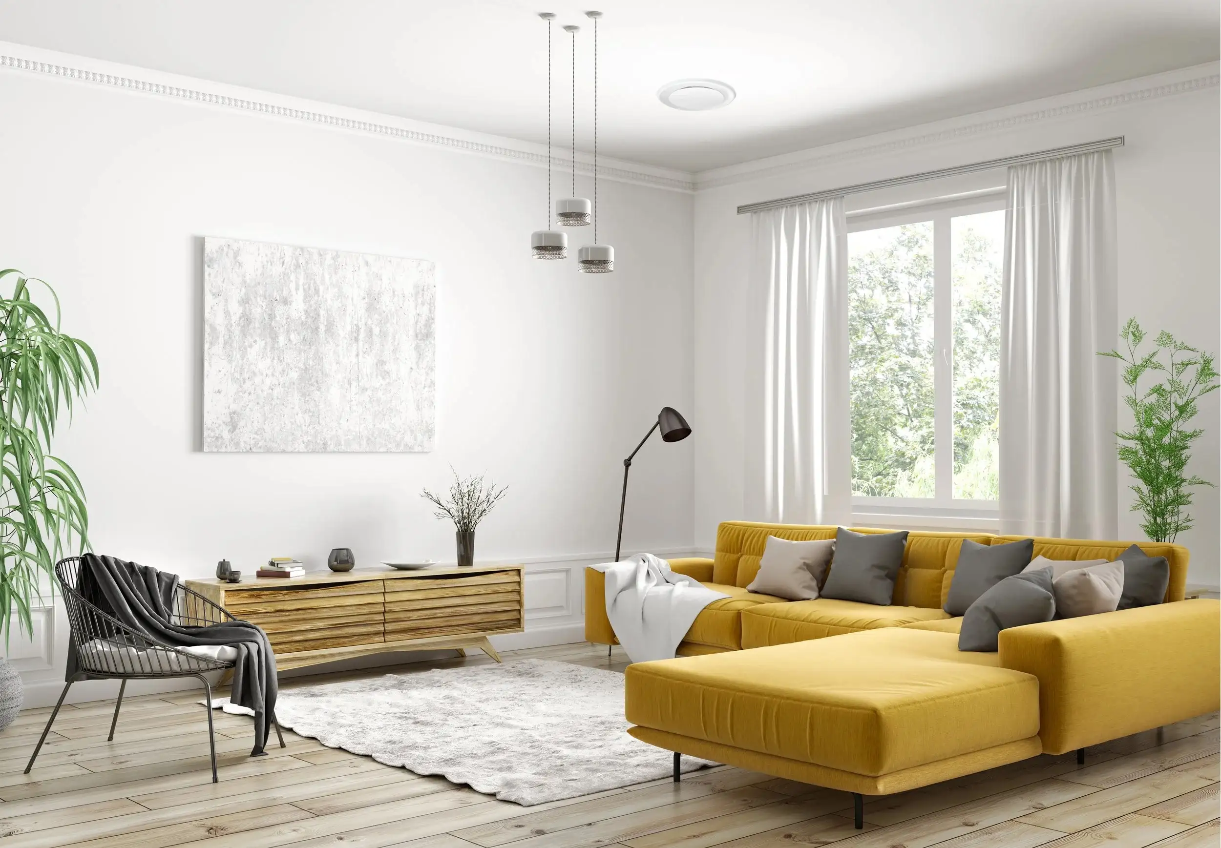A bright living room with a mustard-yellow corner sofa, pale floorboards and a tall curtained window, with a circular ceiling outlet set into the white ceiling above